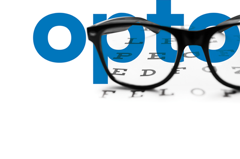 Advanta Medica bold blue optometrist text with eye chart and horn-rimmed eyeglasses icon
